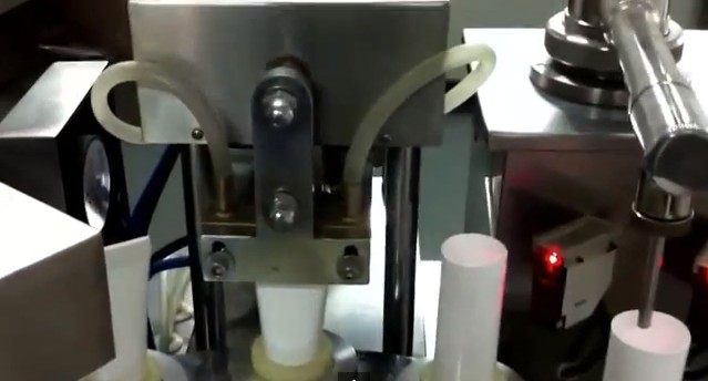 tube filling sealing with aligning system ट्यूब भराव मुहर संरेखित सेंसर.jpg