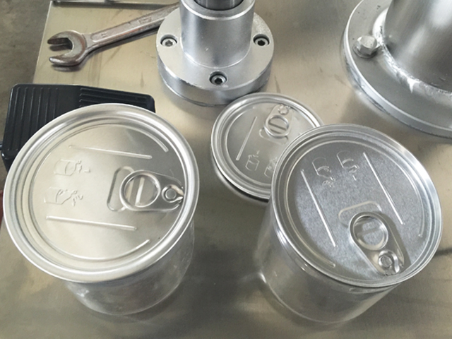 धातु के डिब्बे कैपिंग मशीन.jpg