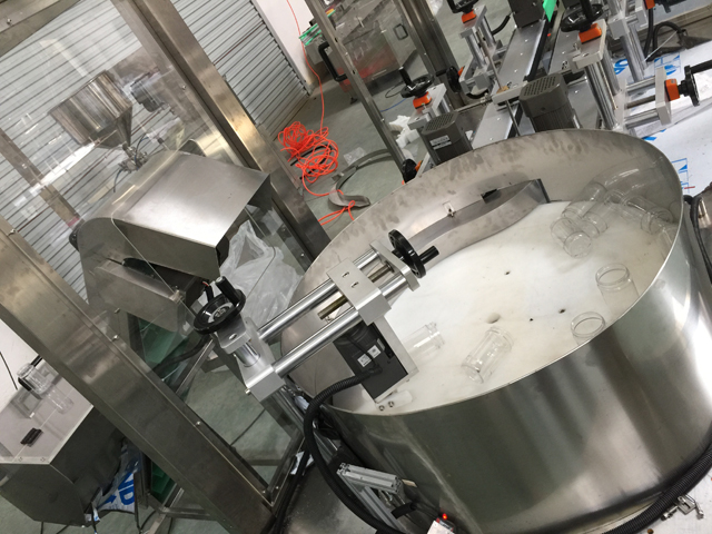 बोतलें unscrambler उठाने प्रणाली.jpg