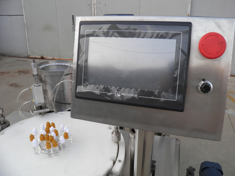 filling plugging capping labeling production line ई तरल पीएलसी बोतल भराव कैपिंग लेबलिंग.jpg