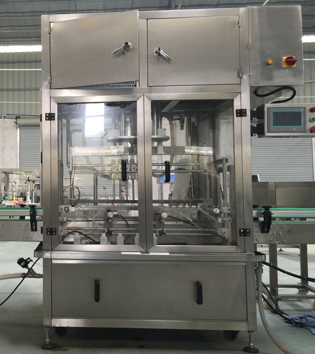Linear filling machine with 4 filling heads रैखिक भरने की मशीन.jpg