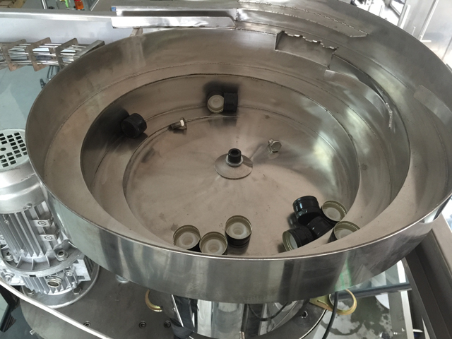 कैप्स वाइब्रेटर फीडिंग सिस्टम.jpg