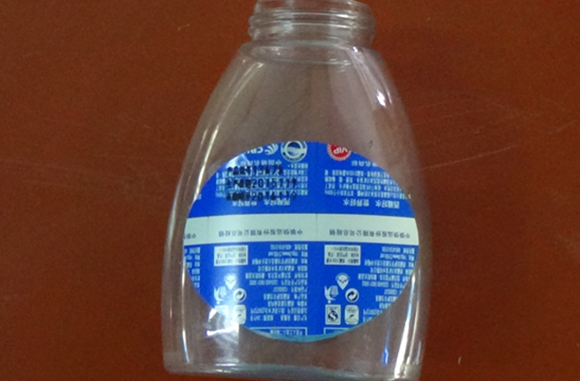 फ्लैट बोतलों के लिए रोलिंग लेबलिंग मशीन samples.jpg