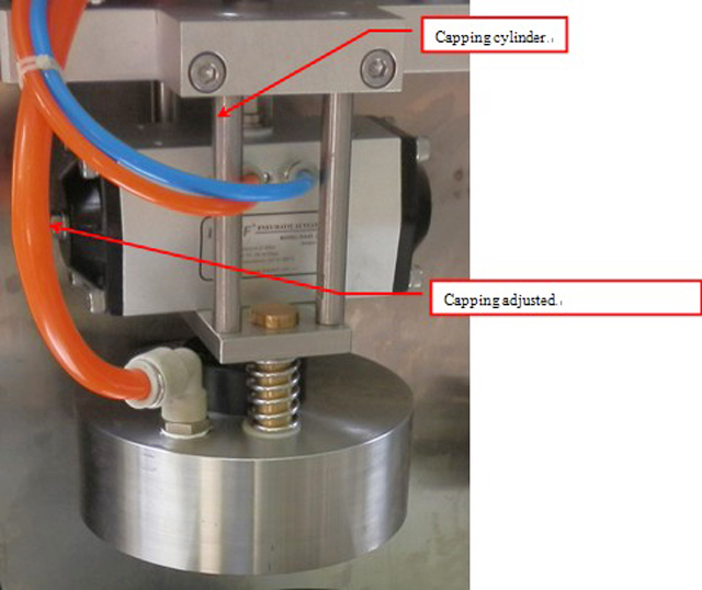 capping part from semi automatic vacuum capper कैपिंग हेड.jpg