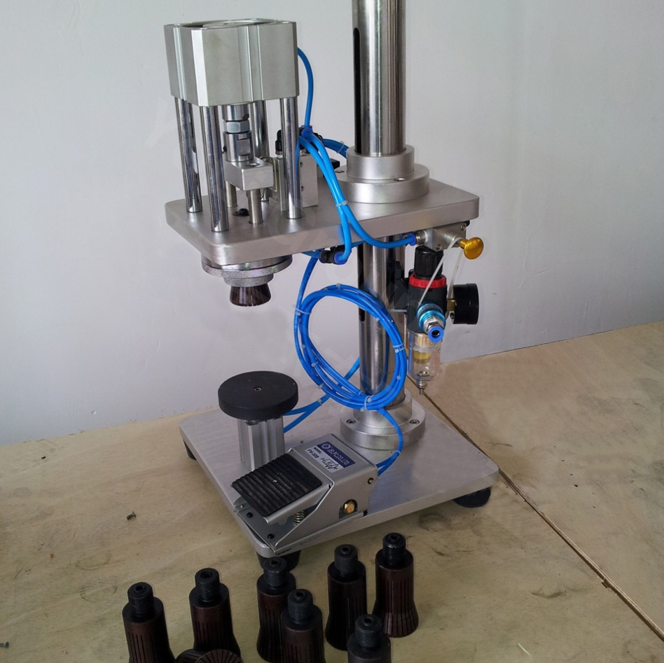 manual crimping machine for glass bottles वायवीय कैपिंग उपकरण अर्ध स्वचालित वायवीय.jpg