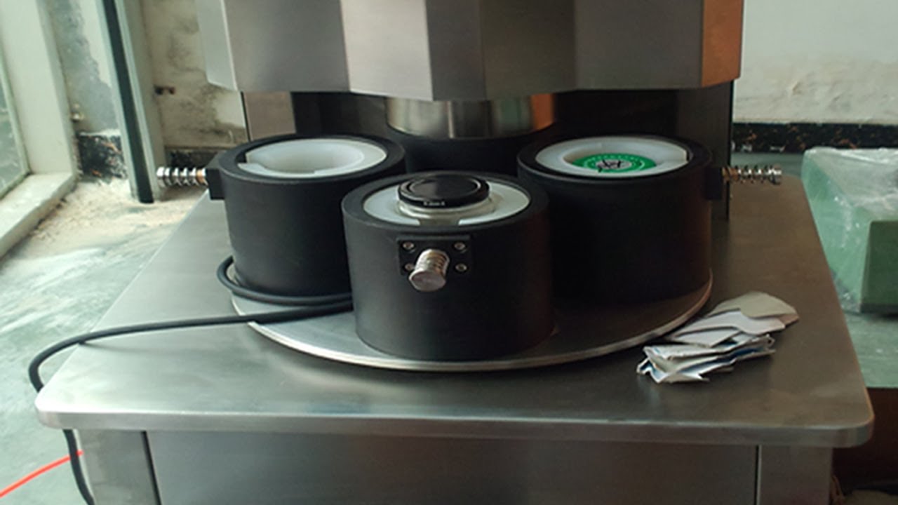 four heads vacuum capping machine semi automatic वैक्यूम कैपर मैनुअल.jpg
