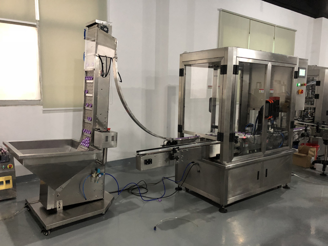 कैपिंग मशीन कॉस्मेटिक मशीनें.JPG